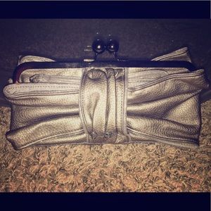 Jessica Simpson silver bow wristlet